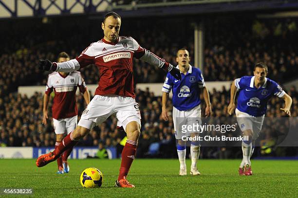 Dimitar Berbatov of Fulham scores his team's first goal from the penalty spot during the Barclays Premier League match between Everton and Fulham at...