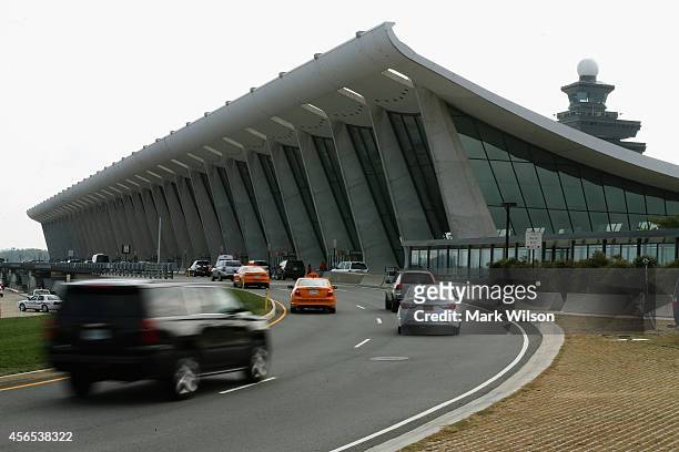 The main terminal at Washington Dulles International Airport is shown October 2, 2014 in Dulles, Virginia. The Center for Disease Control CDC...