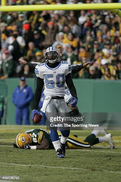 Ernie Sims of the Detroit Lions walking on the field during a game against the Green Bay Packers on December 17, 2006 at Lambeau Field in Green Bay,...