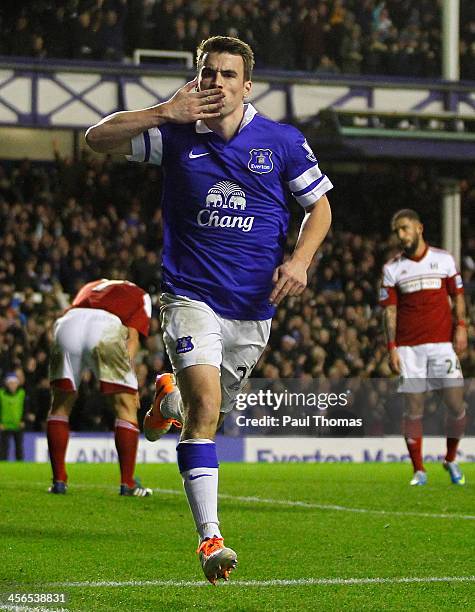 Seamus Coleman of Everton celebrates after scoring his team's second goal during the Barclays Premier League match between Everton and Fulham at...