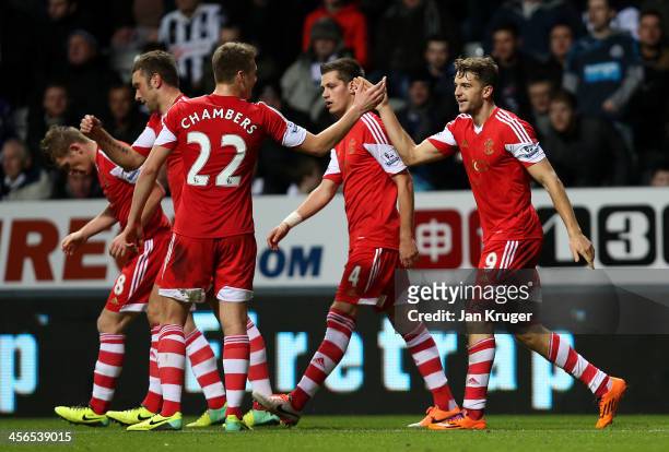 Jay Rodriguez of Southampton celebrates with team-mates after scoring his team's first goal to equalise during the Barclays Premier League match...