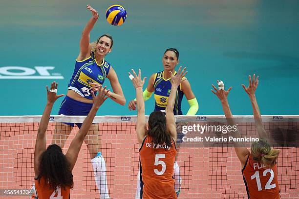 Thaisa Menezes of Brazil spikes against Netherlands block during the FIVB Women's World Championship pool F match between Brazil and Netherlands on...