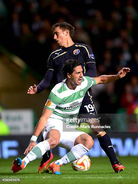Beram Kayal of Celtic is tackled in the penalty box by Josip Pivaric of Dinamo Zagreb during the UEFA Europa League group D match between Celtic and...
