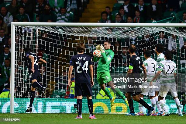 Celtic goalkeeper Craig Gordon makes a key save during the UEFA Europa League group D match between Celtic and Dinamo Zagreb at Celtic Park on...