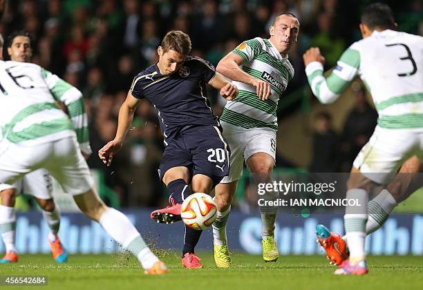 Dinamo Zagreb's Croatian midfielder Marko Pjaca shoots, under pressure from Celtic's Scottish midfielder Scott Brown during the UEFA Europa League,...