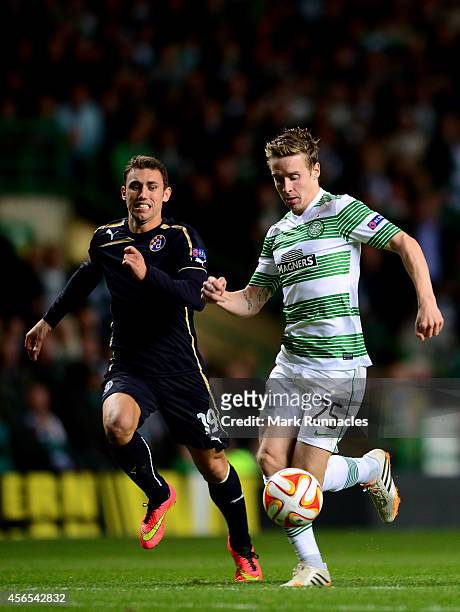 Stefan Johnansen of Celtic takes on Josip Pivaric of Dinamo Zagreb during the UEFA Europa League group D match between Celtic and Dinamo Zagreb at...