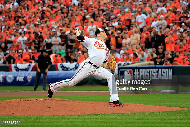 Chris Tillman of the Baltimore Orioles throws a pitch in the first inning against against the Detroit Tigers during Game One of the American League...