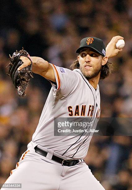 Madison Bumgarner of the San Francisco Giants pitches against the Pittsburgh Pirates during the National League Wild Card game at PNC Park on October...