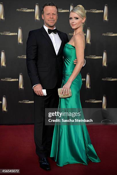 Jenke von Wilmsdorff and Mia Bergmann arrive at the "Deutscher Fernsehpreis 2014" at Coloneum on October 2, 2014 in Cologne, Germany.