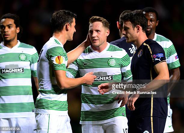 Kris Commons of Celtic receives a pat on the check for team mate Alexander Tonev during the 1-0 victory over Dinamo Zagreb during the UEFA Europa...