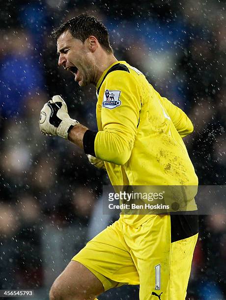 David Marshall of Cardiff celebrates after Peter Whittingham scores his team's opening goal of the game during the Barclays Premier League match...