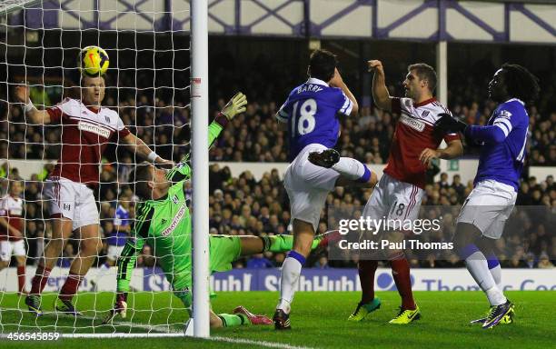 Gareth Barry of Everton scores his team's third goal during the Barclays Premier League match between Everton and Fulham at Goodison Park on December...