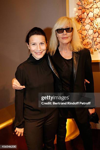 Betty Catroux and her daughter Daphnee Catroux attend "Monsieur Dior Il etait une fois..." book signingin Galerie Passebon on October 2, 2014 in...