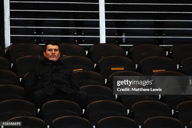 Former Manchester United player and football pundit Roy Keane waits for the start of the Barclays Premier League match between Hull City and Stoke...