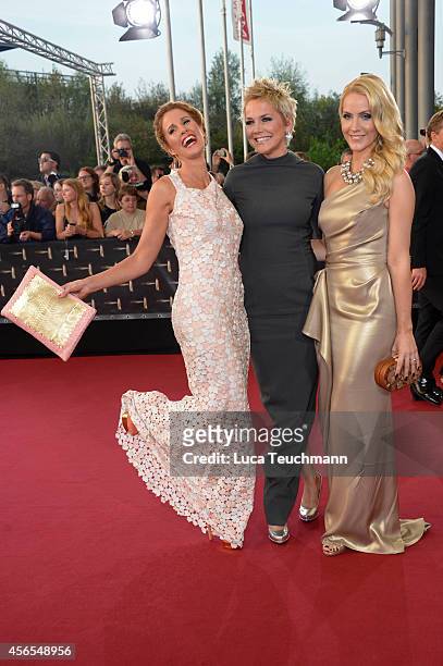 Mareile Hoeppner; Inka Bause and Judith Rakers attend the red carpet of the Deutscher Fernsehpreis 2014 at Coloneum on October 2, 2014 in Cologne,...