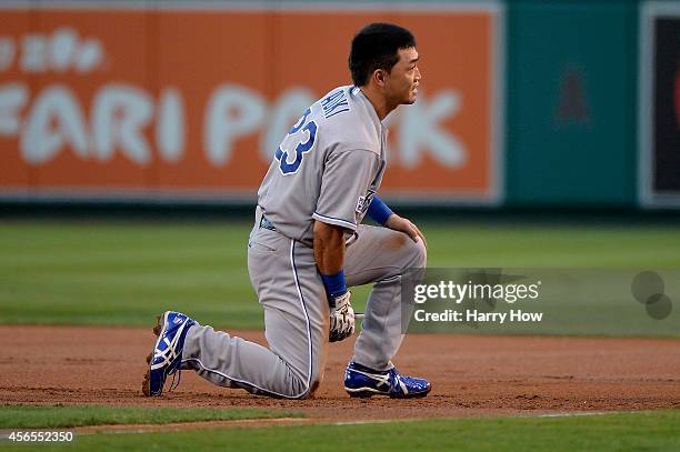 Norichika Aoki of the Kansas City Royals reacts after being picked off at first base against the Los Angeles Angels to end the first inning during...