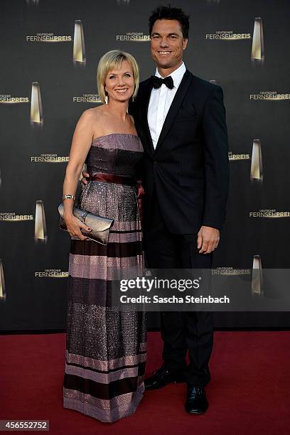 Ilka Essmueller and Boris Buettner arrive at the "Deutscher Fernsehpreis 2014" at Coloneum on October 2, 2014 in Cologne, Germany.