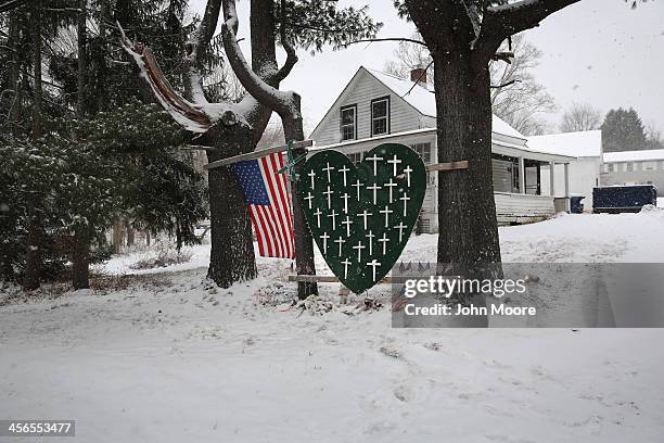 Memorial to massacre victims stands near the former site of Sandy Hook Elementary on December 14, 2013 in Newtown, Connecticut. One year ago Adam...