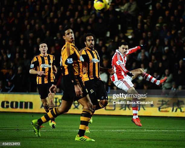 Oussama Assaidi of Stoke City shoots during the Barclays Premier League match between Hull City and Stoke City at KC Stadium on December 14, 2013 in...