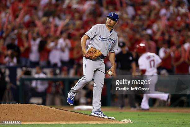 Jason Vargas of the Kansas City Royals reacts after allowing a solo home run to Chris Iannetta of the Los Angeles Angels in the third inning during...