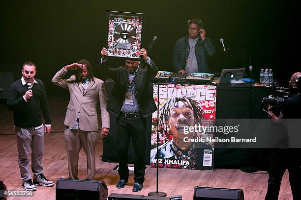Lance Pillersdorf, David Jones, and L. Londell McMillan appear on stage at the wrap party during AWXI at Webster Hall on October 2, 2014 in New York...