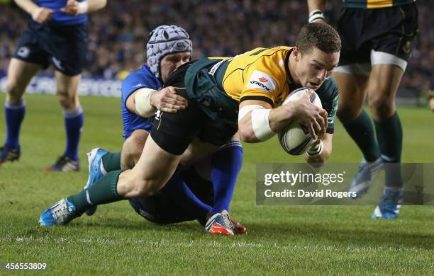 George North of Northampton dives over for the first try during the Heineken Cup pool 1 match between Leinster and Northampton Saints at the Aviva...