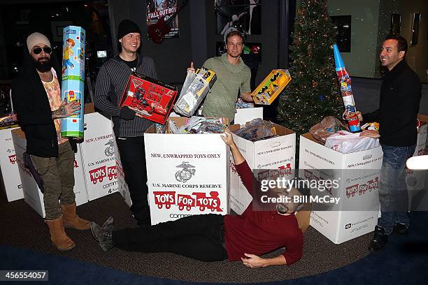 Maclean, Nick Carter, Brian Littrell, Kevin Richardson and Howie Dorough of The Backstreet Boys attend the Mix 106.1 & Q102 Toys For Tots Collection...