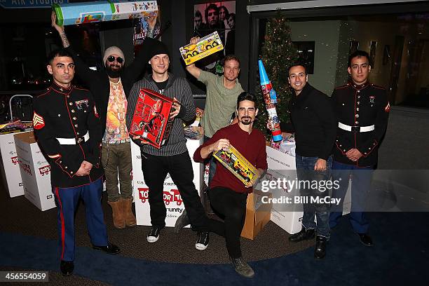 Marine Corps Sargeant Cranney, A.J. Maclean, Nick Carter, Brian Littrell, Kevin Richardson and Howie Dorough of The Backstreet Boys along with Marine...