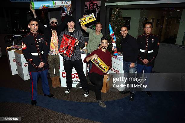 Marine Corps Sargeant Cranney, A.J. Maclean, Nick Carter, Brian Littrell, Kevin Richardson and Howie Dorough of The Backstreet Boys along with Marine...
