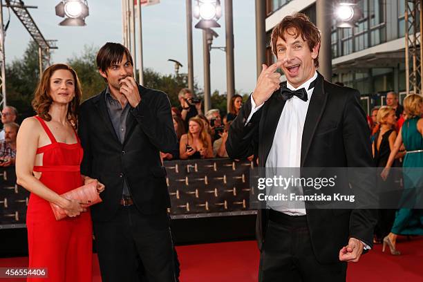 Max Simonischek, Ingolf Lueck and guest attend the red carpet of the Deutscher Fernsehpreis 2014 on October 02, 2014 in Cologne, Germany.