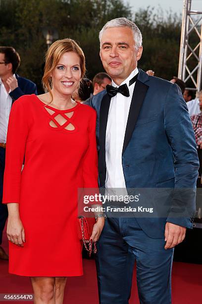 Andreas von Thien and guest attend the red carpet of the Deutscher Fernsehpreis 2014 on October 02, 2014 in Cologne, Germany.