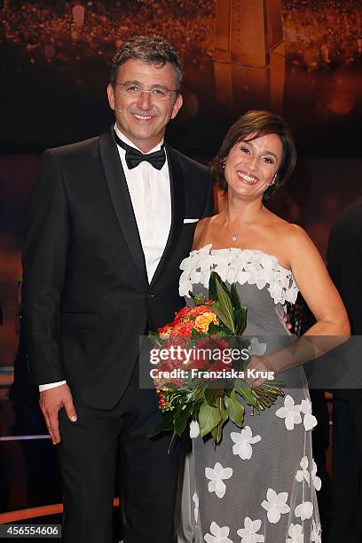 Hans Sigl and Sandra Maischberger attend the Deutscher Fernsehpreis 2014 after show party on October 02, 2014 in Cologne, Germany.