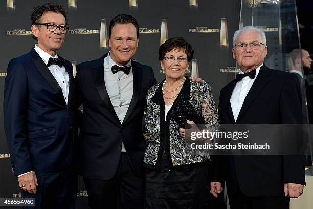 Frank Mutter, Guido Maria Kretschmer, his mother Marianne Kretschmer and his father Erich Kretschmer arrive at the "Deutscher Fernsehpreis 2014" at...