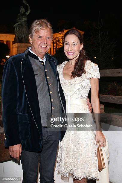 Karlheinz Koegel and his wife Dagmar Koegel during Oktoberfest at Kaeferzelt/Theresienwiese on October 2, 2014 in Munich, Germany.