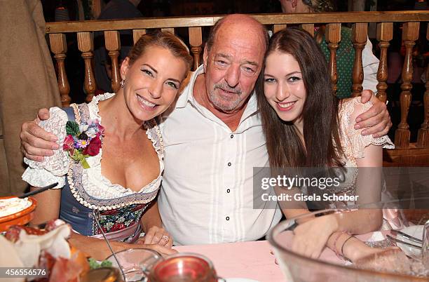Ralph Siegel and his daughter Giulia and daughter Alana during Oktoberfest at Kaeferzelt/Theresienwiese on October 2, 2014 in Munich, Germany.