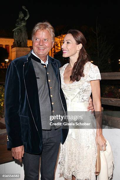 Karlheinz Koegel and his wife Dagmar Koegel during Oktoberfest at Kaeferzelt/Theresienwiese on October 2, 2014 in Munich, Germany.