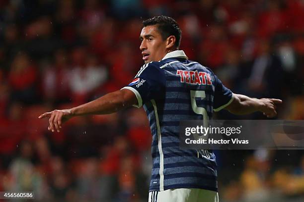 Patricio Araujo of Chivas points during a match between Toluca and Chivas as part of 11th round Apertura 2014 Liga MX at Nemesio Diez Stadium on...