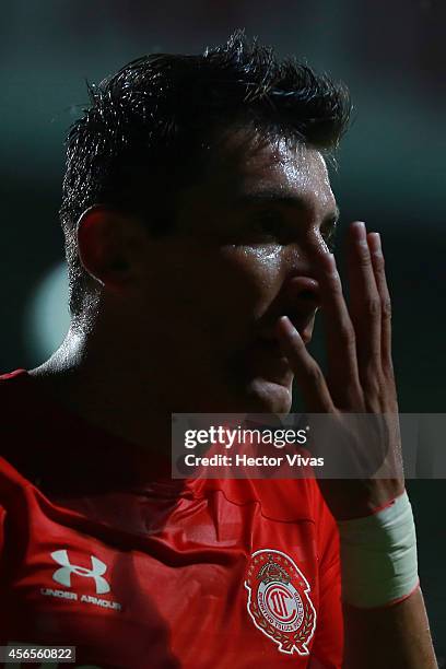 Edgar Benitez of Toluca gestures during a match between Toluca and Chivas as part of 11th round Apertura 2014 Liga MX at Nemesio Diez Stadium on...