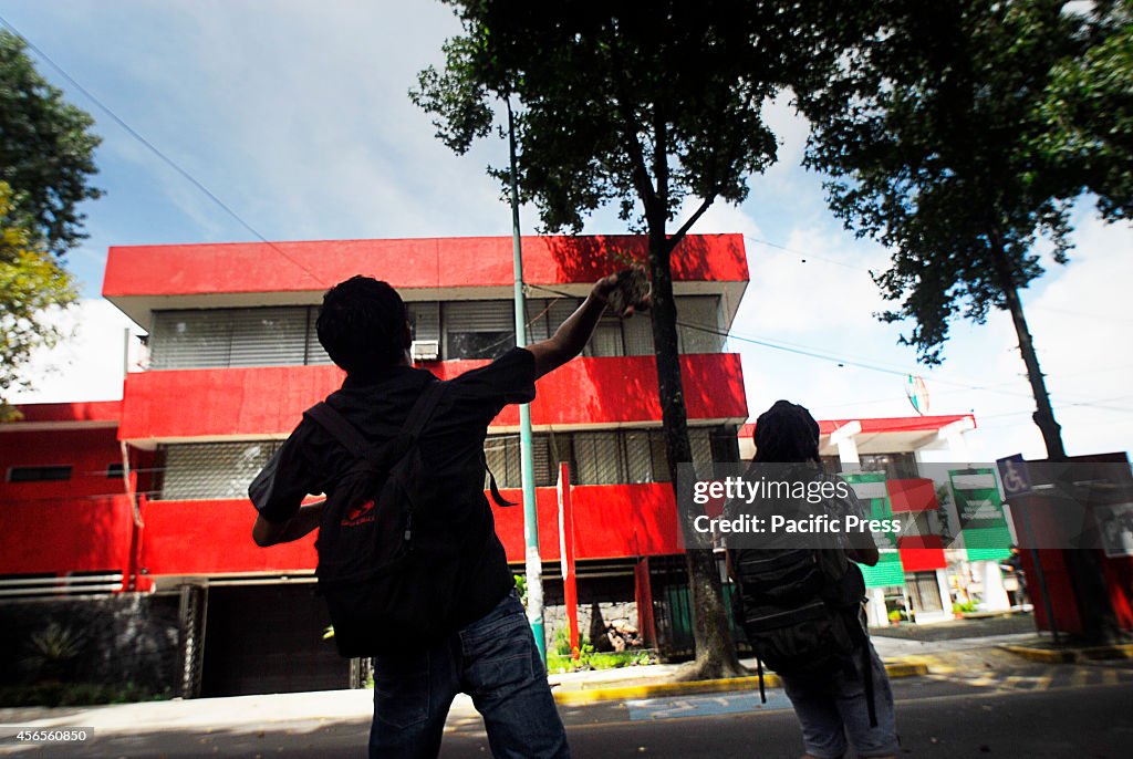 "Anarchists" march through the streets  of Veracruz and some...