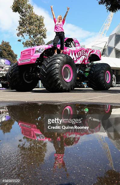 Debra Miceli poses on her truck Madusa during a media opportunity ahead of Monster Jam at AAMI Park on October 3, 2014 in Melbourne, Australia.