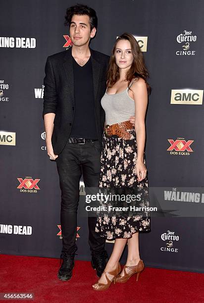 Nick Simmons and guest attend the season 5 premiere of "The Walking Dead" at AMC Universal City Walk on October 2, 2014 in Universal City, California.