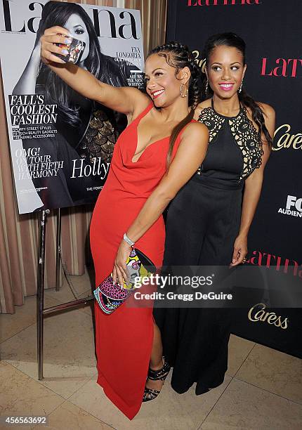 Christina Milian and sister Danielle Flores arrive at LATINA Magazine "Hollywood Hot List" party at Sunset Tower Hotel on October 2, 2014 in West...