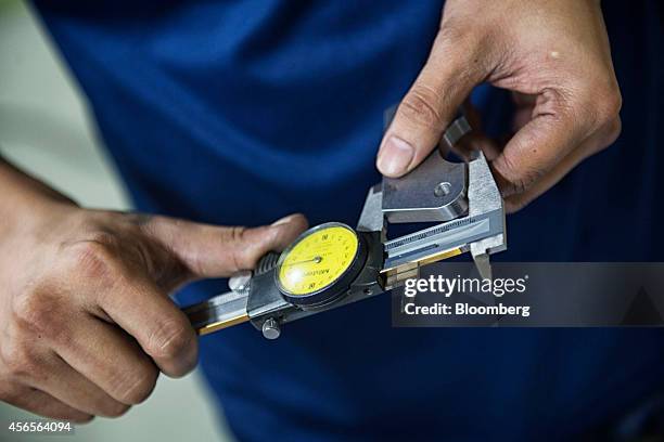 Worker Using Calipers 1,072 Calipers Metal Stock Photos, High-Res Pictures, and Images ...