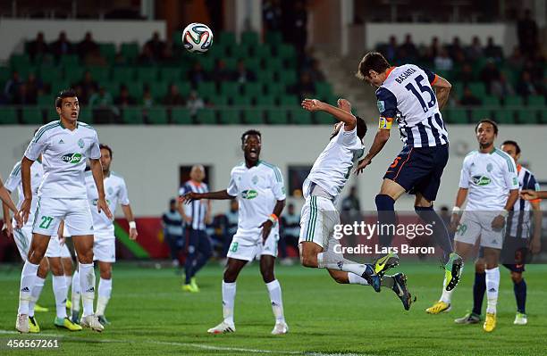 Jose Maria Basanta of Monterrey heads his teams first goal during the FIFA Club World Cup Quarterfinal match between Raja Casablanca and CF Monterrey...