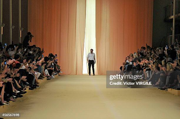 Model walks the runway during the Hermes Ready to Wear show as part of the Paris Fashion Week Womenswear Spring/Summer 2015 on October 1, 2014 in...