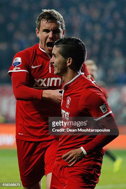 Felipe Gutierrez of Twente celebrates with team-mate Andreas Bjelland after scoring the opening goal during the Eredivisie match between FC Twente...