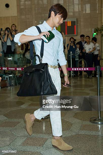 Max of South Korean boy band TVXQ is seen on departure at Gimpo International Airport on October 3, 2014 in Seoul, South Korea.