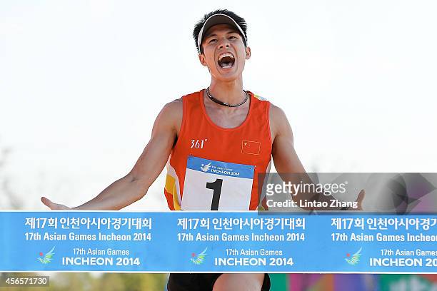Guo Jianli of China celebrates winning the Modern Pentathlon Men's Individual Combined in day fourteen of the 2014 Asian Games at Dream Park...