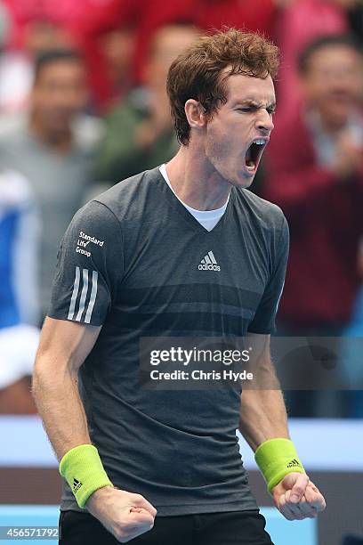 Andy Murray of Great Britain celebrates winning his match against Marin Cilic of Croatia during day seven of the China Open at the National Tennis...