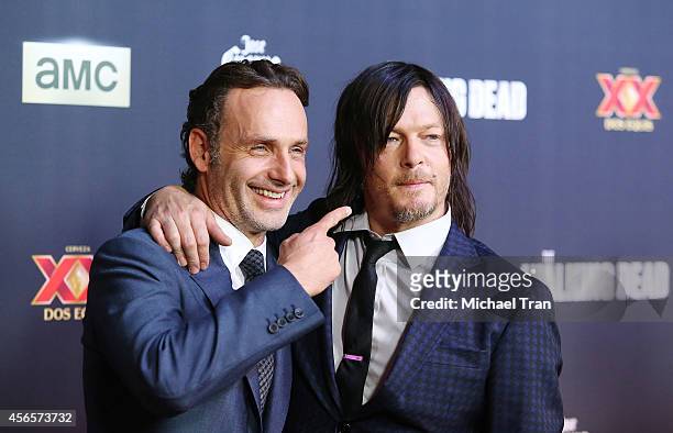 Andrew Lincoln and Norman Reedus arrive at AMC's "The Walking Dead" Season 5 Premiere held at AMC Universal City Walk on October 2, 2014 in Universal...